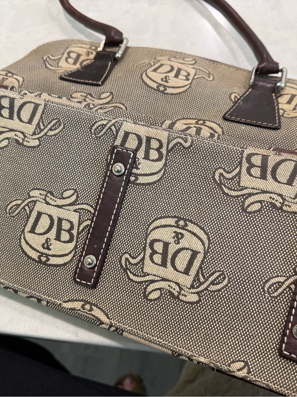 Dooney & Bourke Brown
Signature Donegal Crest Dome
Satchel, Used & Vintage - Picture 9 of 9